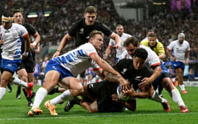 Leicester Fainga’anuku scores a try in the Rugby World Cup between the All Blacks and Namibia at Stadium de Toulouse.
