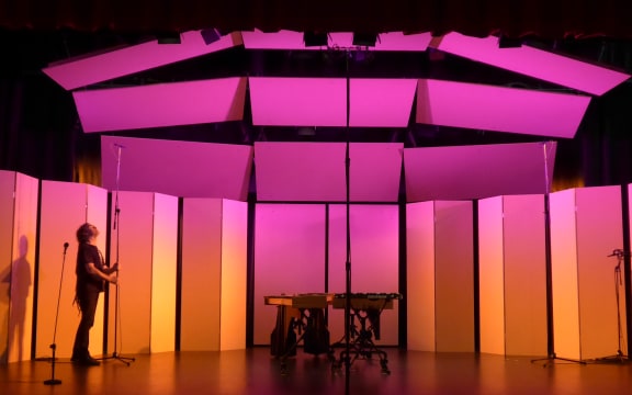 RNZ recording engineer Darryl Stack sets up his microphones ready to record 'Karekurenai'