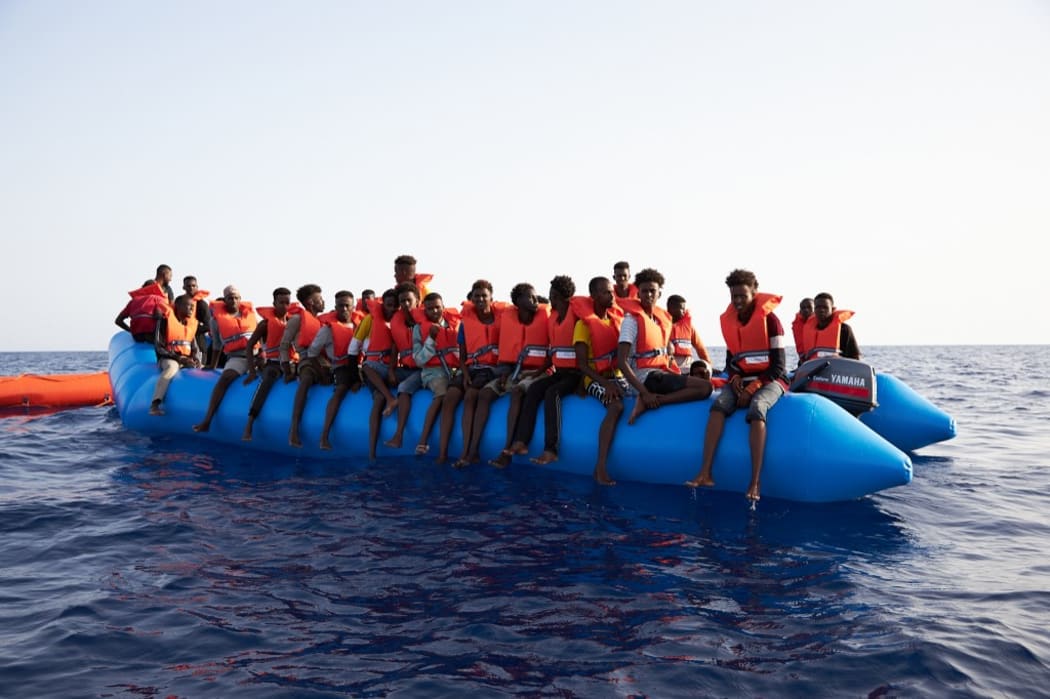 An overloaded rubber boat in international waters off the Libyan coast earlier this month.