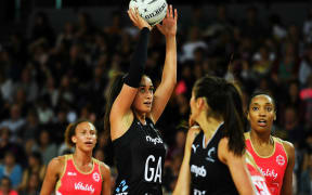 Silver Ferns Maria Folau shoots for a goal  against the England