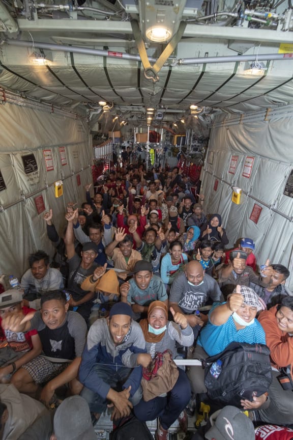 NZ Defence Force Hercules lands in Palu to evacuate displaced people.