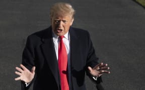 US President Donald Trump speaks to the media as he arrives at the White House in Washington, DC, on January 6, 2019, after meetings at Camp David.