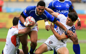 Siaosi Asofolau carries the ball for Samoa