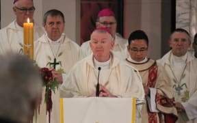 Bishop John Adams briefly met Pope Francis last year and said he was struck by his charisma.