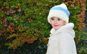 Child in woollen hat