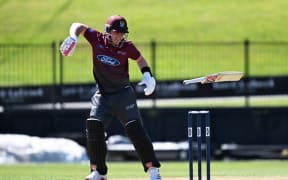 Tim Seifert of Northern Districts Brave is hit on the hand.