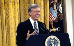 United States President Jimmy Carter holds a press conference in the East Room of the White House in Washington, DC on August 4, 1980. The President discussed the scandal surrounding his brother Billy. Carter said there was no impropriety in his brother's activities and insisted neither he nor any member of his administration broke any laws. The President went on to say his brother tried to free the American hostages being held in Iran through his dealings with the Libyans. Credit: Benjamin E. "Gene" Forte / CNP - NO WIRE SERVICE - (Photo by Benjamin E. "gene" Forte / DPA / dpa Picture-Alliance via AFP)