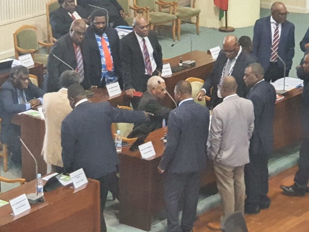 Vanuatu government MPs close ranks after the speaker moves to suspend 18 of their MPs, including the prime minister and deputy prime minister. 8 June 2021
