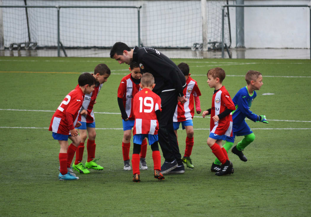 children play soccer