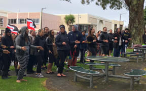 More than 80 people gathered in a peaceful protest against a proposal to scrap the Faculty of Māori and Indigenous Studies.