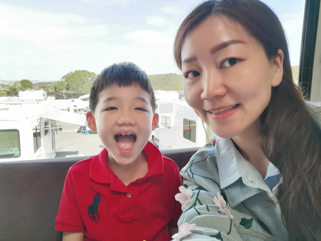 Fenny Qiu and 7yo son Ethan in their campervan.