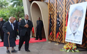 Sir Michael Somare and James Marape at parliament where Sir Mekere Morauta is lying in state