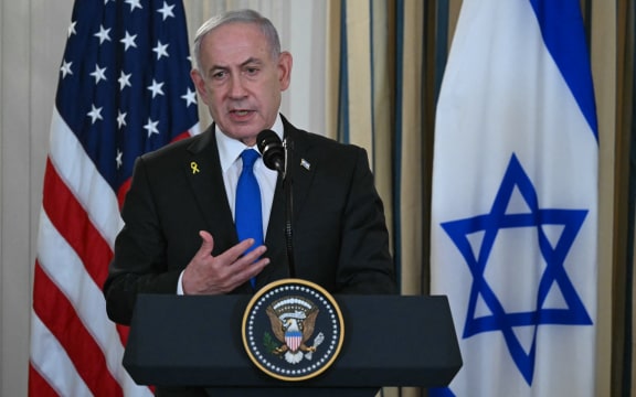 Israeli Prime Minister Benjamin Netanyahu participates in a joint press conference with US President Donald Trump (off frame) in the State Dining Room of the White House in Washington, DC on September 29, 2025. US President Donald Trump said on Monday that Washington was "very close" to securing peace in the Gaza war, after meeting with Israeli Prime Minister Benjamin Netanyahu and releasing a 20-point peace plan. (Photo by ANDREW CABALLERO-REYNOLDS / AFP)