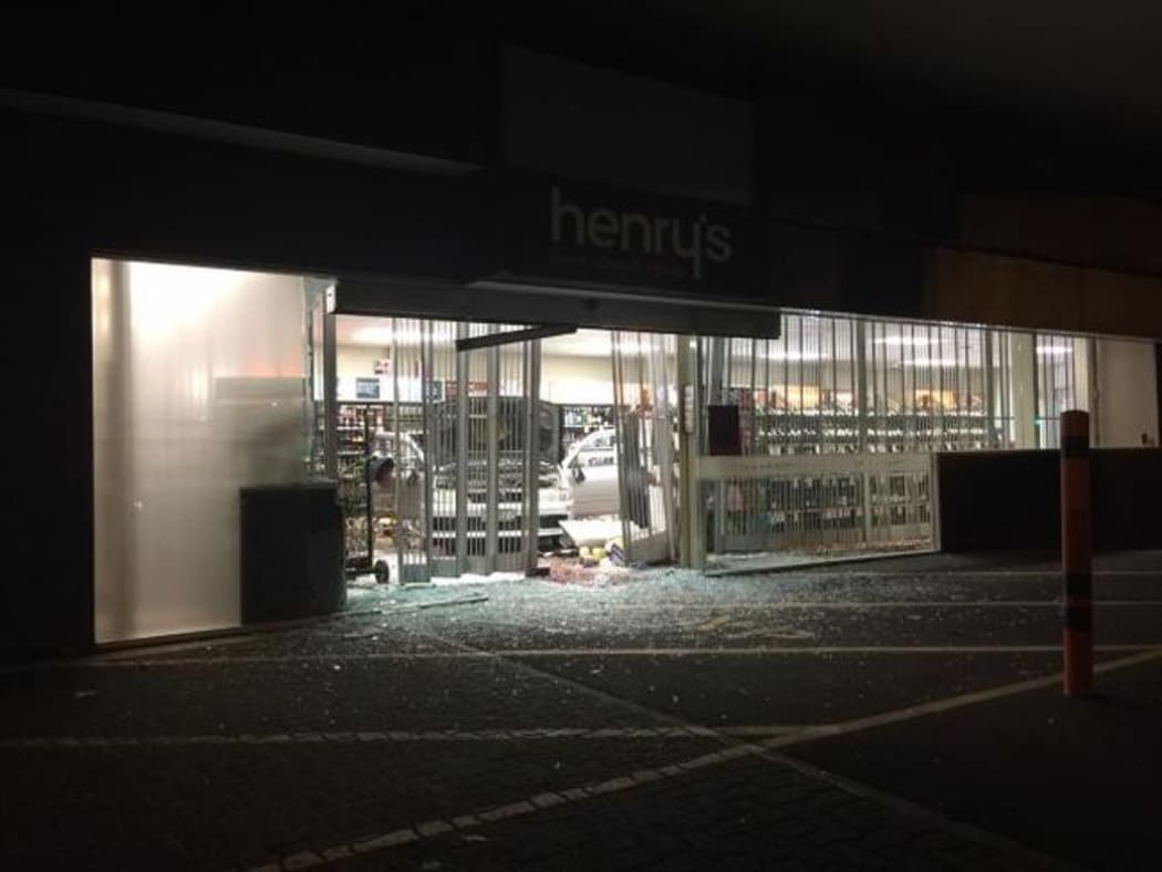 Smashed glass doors at Henry's Liquor store,Yaldhurst Road, Christchurch.
