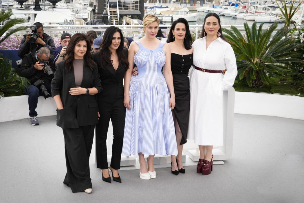 Jury Members Ebru Ceylan, Nadine Labaki, President of the Jury, Greta Gerwig, Eva Green and Lily Gladstone  attends the jury photocall at the 77th annual Cannes Film Festival at Palais des Festivals on May 14, 2024 in Cannes, France. (Photo by Daniele Cifala/NurPhoto) (Photo by Daniele Cifalà / NurPhoto / NurPhoto via AFP)
