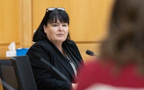 National MP Dana Kirkpatrick listens to evidence in the Foreign Affairs Committee.
