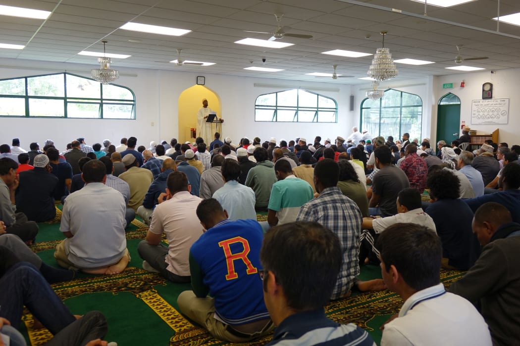 Men praying at Hamilton's Mosque during Friday prayers.