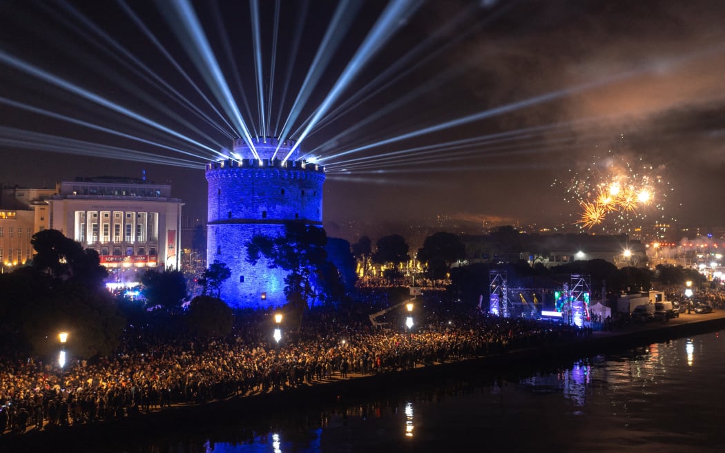 New Year's celebrations in front of the Thessaloniki’s city landmark, White Tower on December 31, 2024. (Photo by Konstantinos Tsakalidis / SOOC / SOOC via AFP)