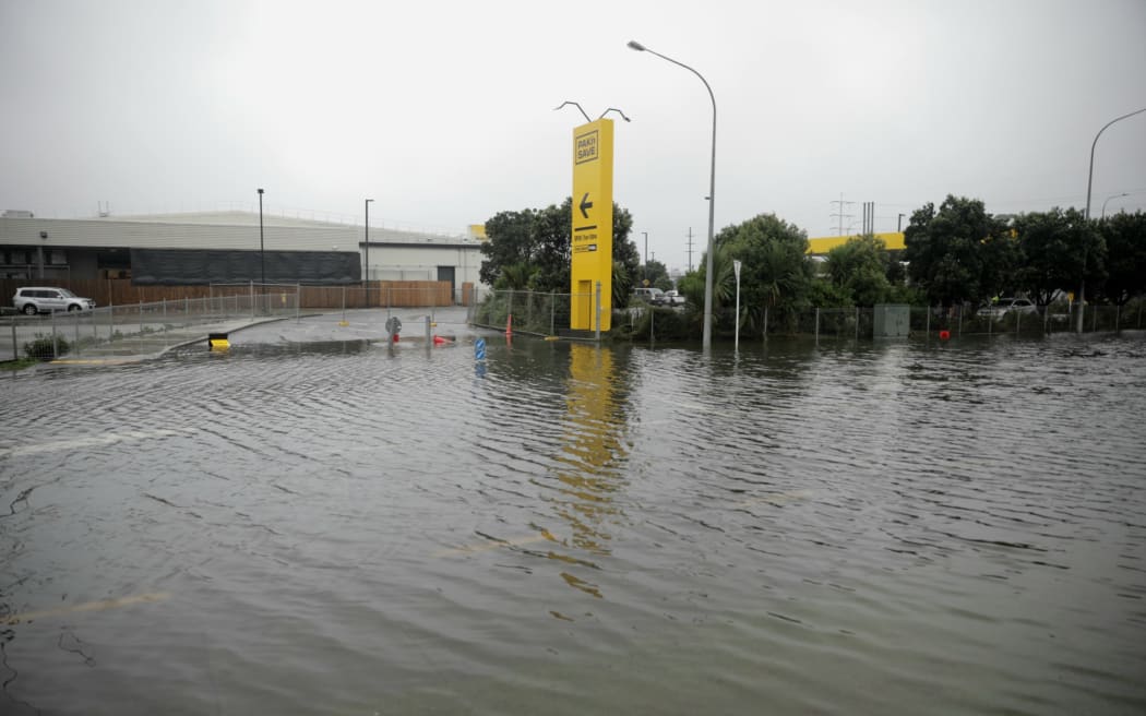 Flooding on Porana Road outside Pak'nSave, Wairau, 1 February 2023.