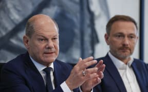 German Chancellor Olaf Scholz and Finance Minister and Free Democrats Party (FDP) leader Christian Lindner address a press conference on the government coalition's relief plan to cope with soaring energy costs on 4 September, 2022.