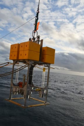 Scientists used this core sampler to extract sediment from the bottom of the trench.
