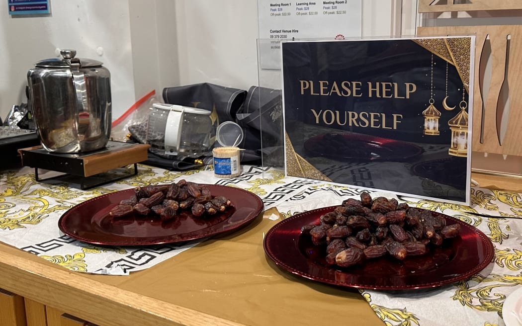 Iftar Breaking fast with dates at Auckland's Ramadan Night Market.