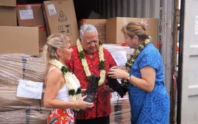 Australian policewoman donates boots to Samoan farmers