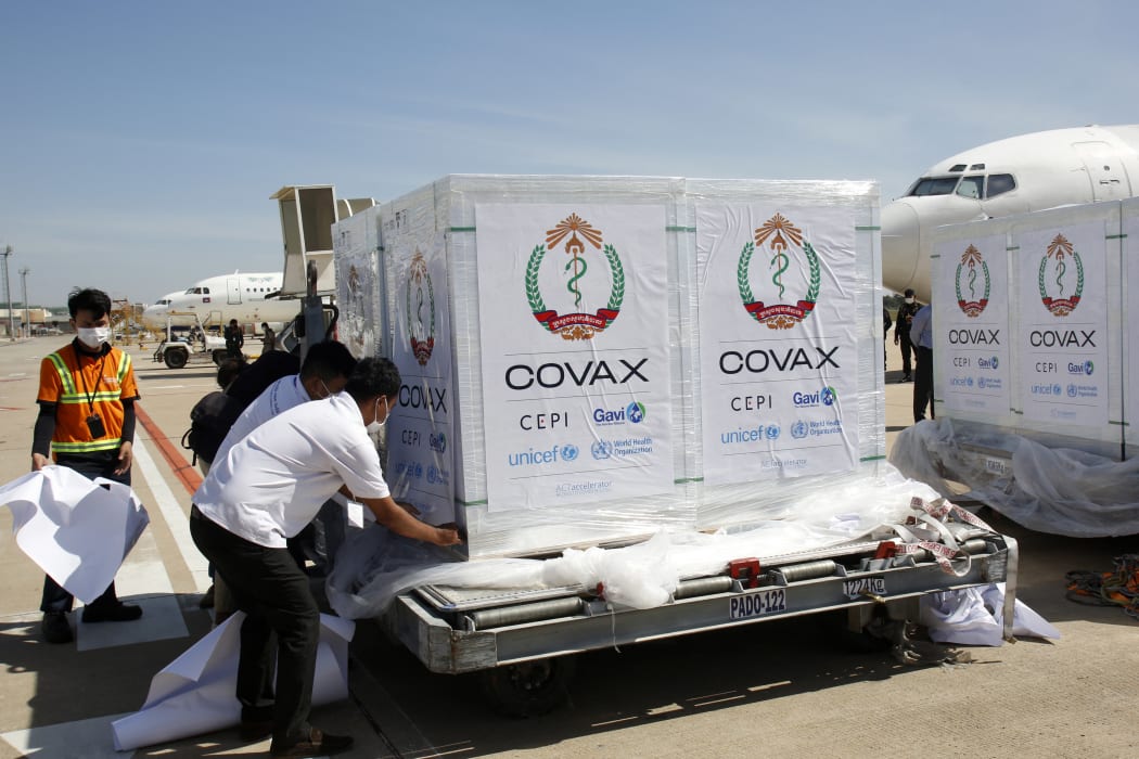 Packages of Covid-19 vaccine arrive at the Phnom Penh International Airport in Cambodia, on 13 December, 2021.
