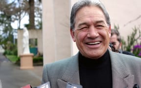 Winston Peters speaks to media after voting in Auckland.