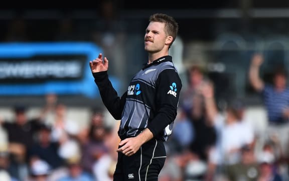 Blackcap player Lockie Ferguson celebrates a wicket.