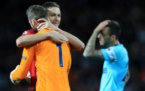 Nemanja Matic of Manchester United and goalkeeper David De Gea celebrate victory over Newcastle.