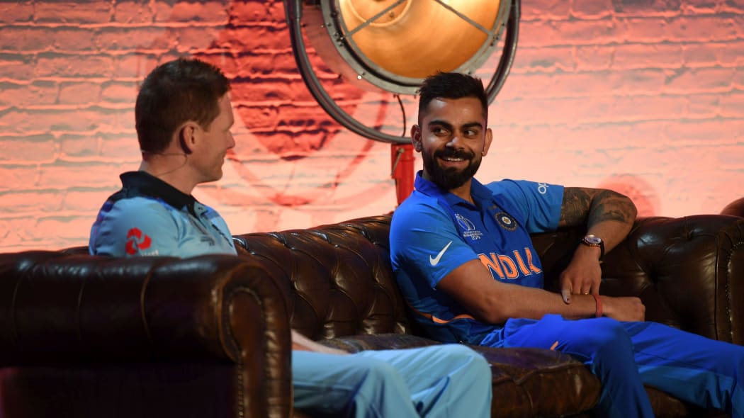 England captain Eoin Morgan and India counterpart Virat Kohli chat prior to the start of the 2019 Cricket World Cup.