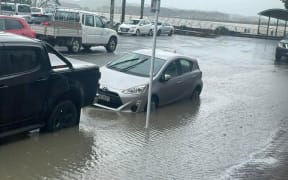 Rain and high tide combined earlier today to cause surface flooding in Dargaville township.