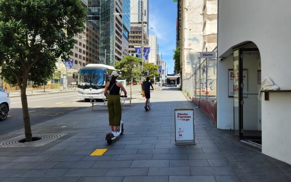 People on e-scooters in Auckland - pictured January 2024.