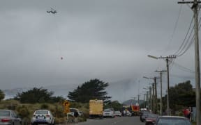 A fire threatening homes on Southshore in Christchurch.