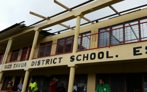 Fiji's Tavua District School shelters evacuees once again despite its gaping roof.