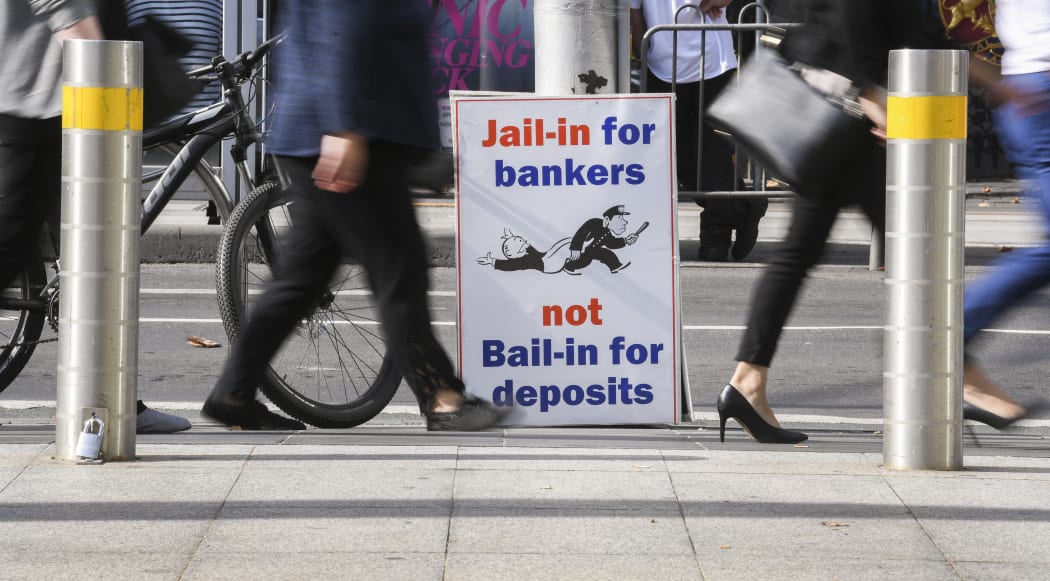 A photo taken in Melbourne on April 23, 2018 show a placard outside the royal commission set up in February to investigate misconduct in the banking sector.