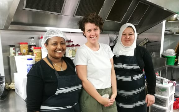From left, Genet Seyoum, Pomegranate Kitchen co-founder Rebecca Stewart, and Fatima Qasim Ali.