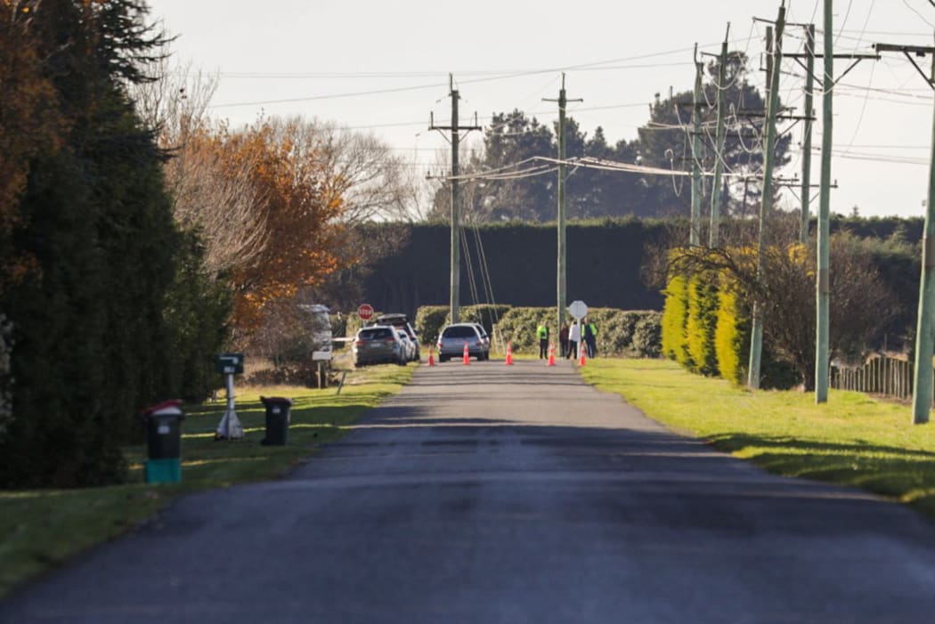 The scene of a crash where four people died after a truck and van collided near Ashburton.