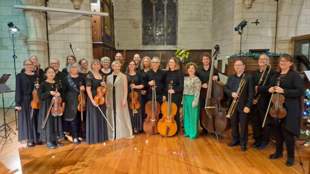 Singers Jayne Tankersley and Erin Atchison pose with the members of NZ Barok after a performance of their concert 'Hark, Sweet Music' in St Luke's Church, Remuera