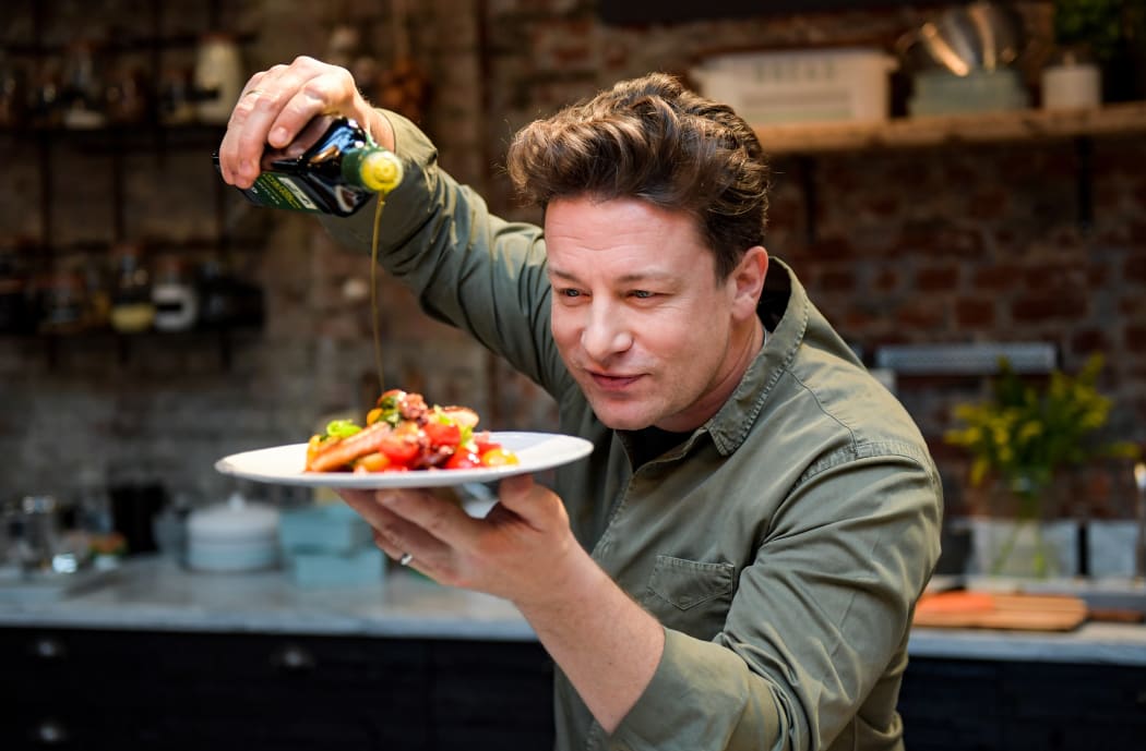 Jamie Oliver cooking at the One Kitchen Culinary School in Hamburg, Germany, in 2017.