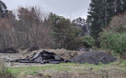South Wairarapa District Council wants the community to dob in suspicious vehicles after large piles of bitumen were illegally dumped at an intersection outside Martinborough.

The bitumen was left at the Hinekura Road and Longbush Road intersection which has previously been the site for illegal dumping of household waste.