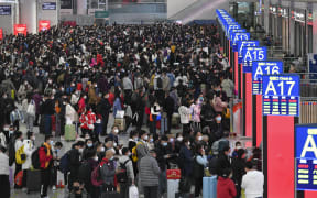 Passengers are seen at Shenzhen North Railway Station in Shenzhen, south China's Guangdong Province, 7 January 2023. The 40-day Spring Festival travel rush in China kicked off Saturday.