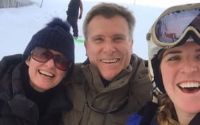 Emma Johnson with her parents during their first trip to New Zealand three years ago.