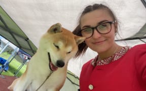 Charly Houtos with Tobi the Shiba Inu