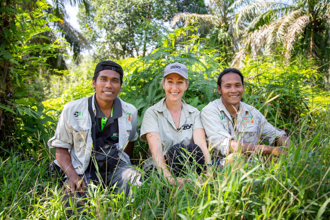 Amy Robbins with two key members of the Sumatran Ranger Project