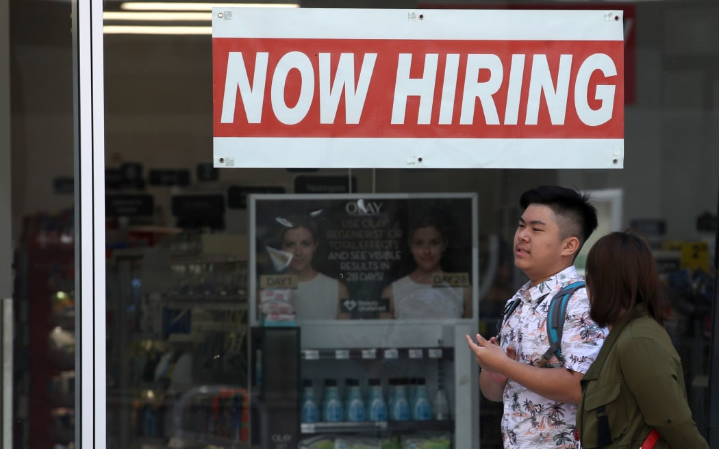 SAN FRANCISCO, CALIFORNIA - JUNE 07: A now hiring sign is posted in the window of a CVS store on June 07, 2019 in San Francisco, California.