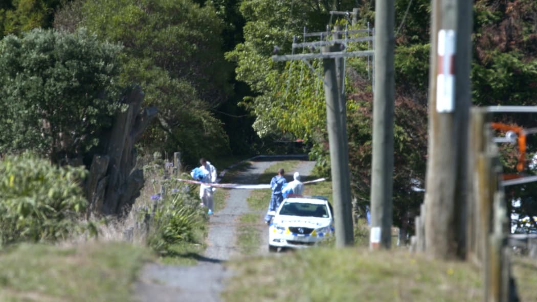 Photographs from outside the cordon at the crime scene in Kingseat.