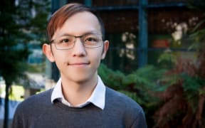 Kyle Tan, a Malaysian Chinese researcher at the University of Waikato with a background in community psychology.