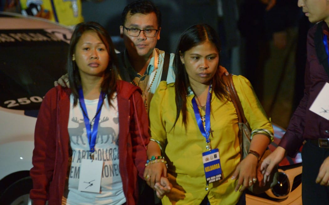 The sisters of death row inmate Mary Jane Veloso leave the port near Nusakambagan prison island.
